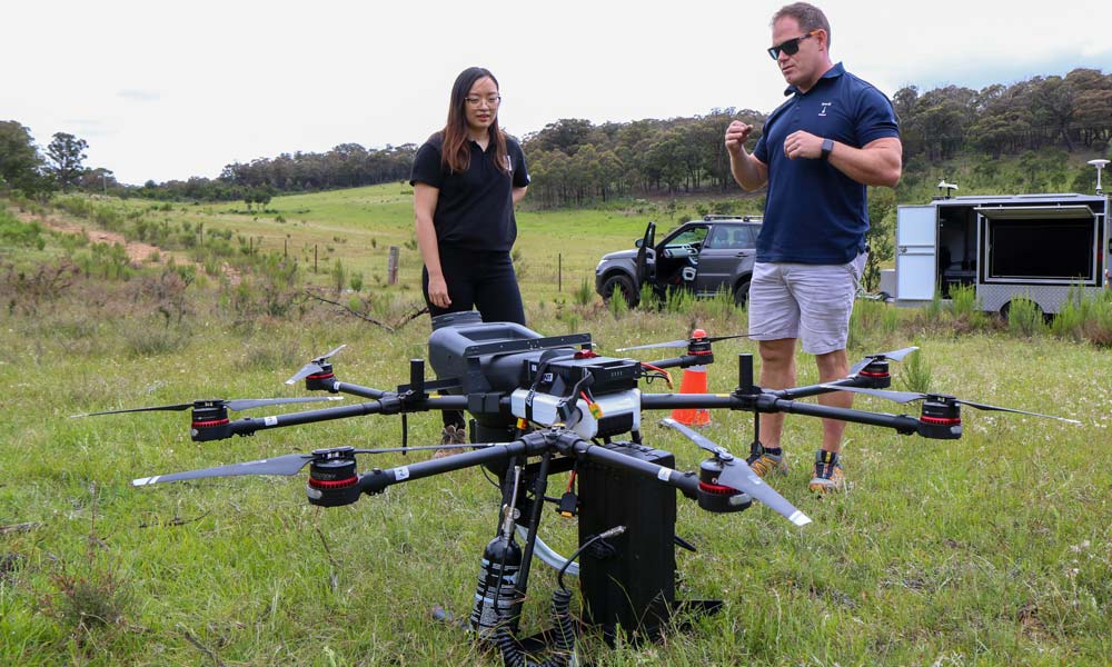 Andrew Walker, founder and CEO of AirSeed Technologies shows us how drone seeding works © WWF-Australia / Paul Fahy